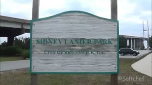 Sidney Lanier Park pier entrance sign entrance sign to the sidney lanier pier under bridge brunswick, ga